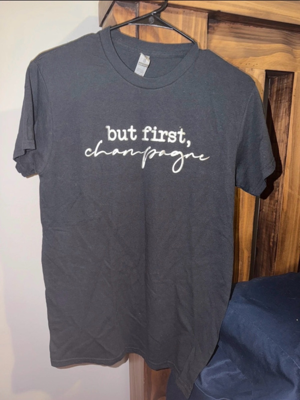 Gildan Black Tee with White "but first, champagne" Script
